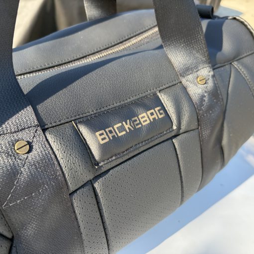 TyAir black leather and leatherette sport bag
